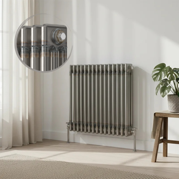 Aura 3 Column Horizontal Radiator 600x605mm Raw Metal installed in a bright modern interior with close-up inset highlighting the premium raw metal finish.