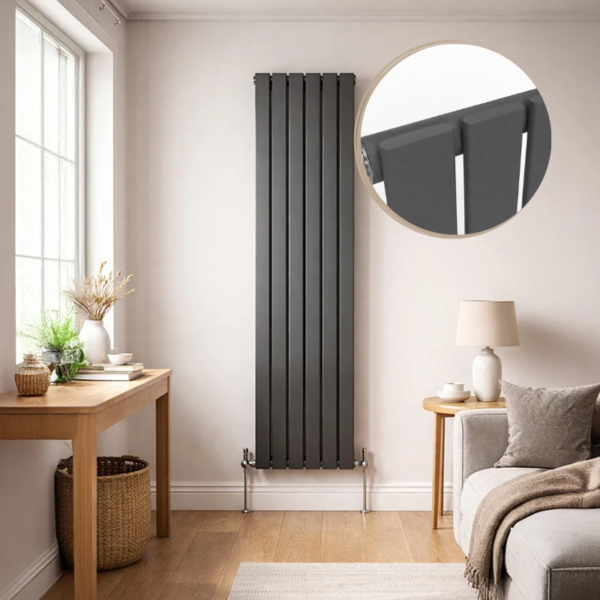 A wide Luna single flat vertical designer radiator in matte anthracite grey, featuring 7 panels, mounted on a light wall in a modern living room setting next to a console table and armchair.