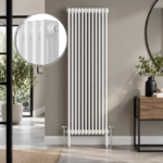 White 3-column vertical radiator installed in a modern living room or hallway