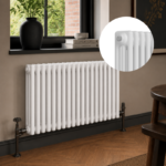 White 3-column horizontal radiator installed in a modern living room or hallway