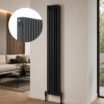 Anthracite 3-column vertical radiator installed in a modern living room or hallway